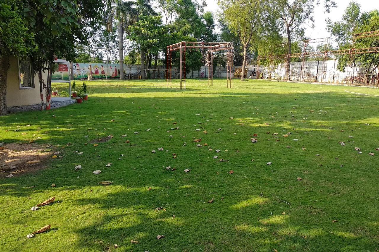 Oyo 14354 Amar Marriage Palace Hotel Dharmpura Esterno foto