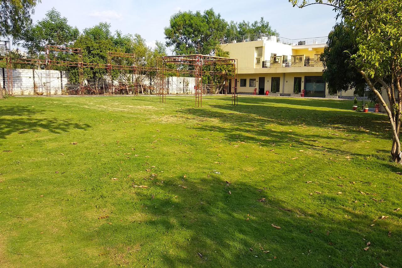 Oyo 14354 Amar Marriage Palace Hotel Dharmpura Esterno foto